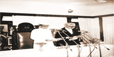 Governor Bhisma Narayan Singh taking the Oath of Office