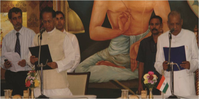 Governor Janaki Ballav Patnaik conferring the Oath of Office to Chief Minister, Tarun Gogoi