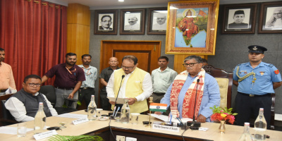 Governor administering the oath of office to Prof. Nanigopal Mahanta as the VC of Gauhati University