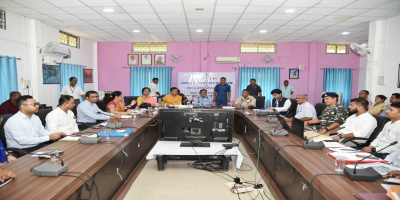 Governor charing a meeting with the district administration of Majuli