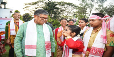 Governor with a nasoni during Bohag Bihu celebration at Raj Bhavan